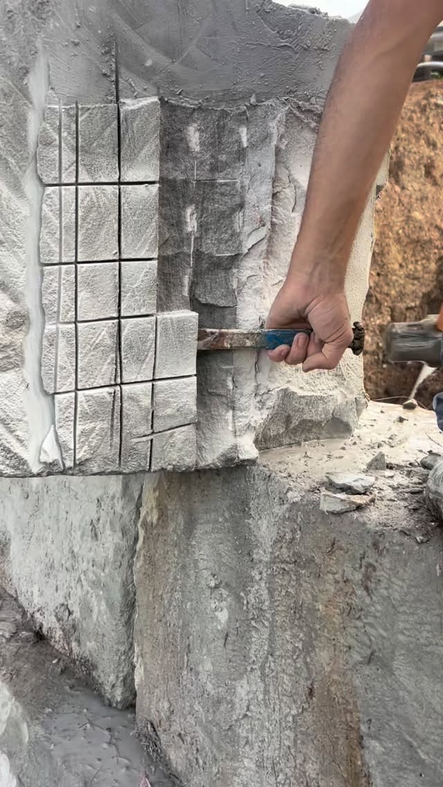 JK Stonemasons crew placing sandstone blocks